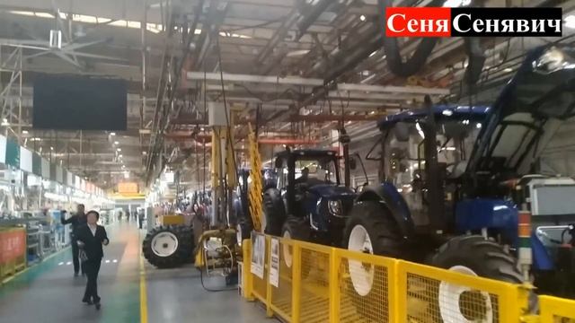 Завод Lovol, цех по сборке тракторов, часть №10 "как собирают Ловол" смотреть онлайн