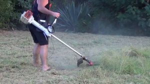 STIHL FS 420 straight shaft trimmer using Uni Click mowing head