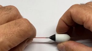 Как вставить кембрик в поплавок.