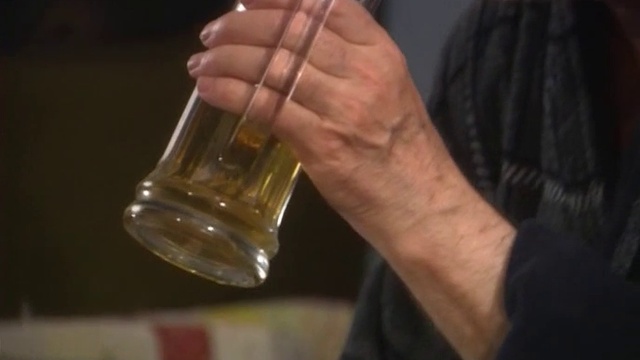 Old Man Drinking Beer