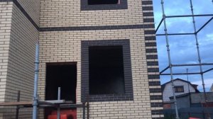 Облицовка монолитного дома кирпичом