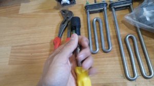 Инструменты и сумка для ремонта стиральных машин.