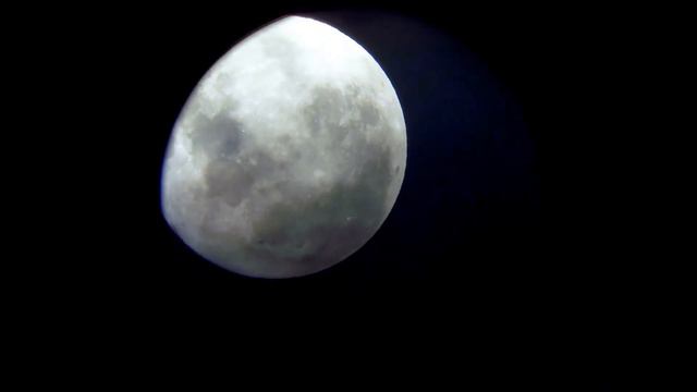 Supermoon through a Celestron C90 MAK telescope смотреть онлайн