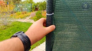 Забор из затеняющей сетки .