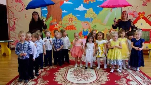 Игра с зонтиками в младшей гр. Муз.рук.Е.Рабская.