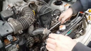 Как снять генератор на  Suzuki Grand Vitara II