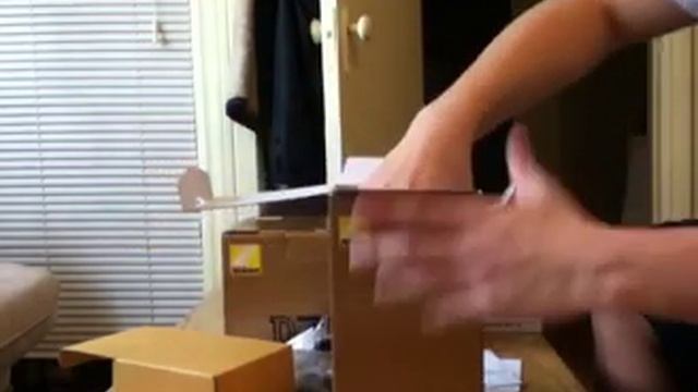 Unboxing of Nikon D7000, 18-200mm VRII and freebies смотреть онлайн