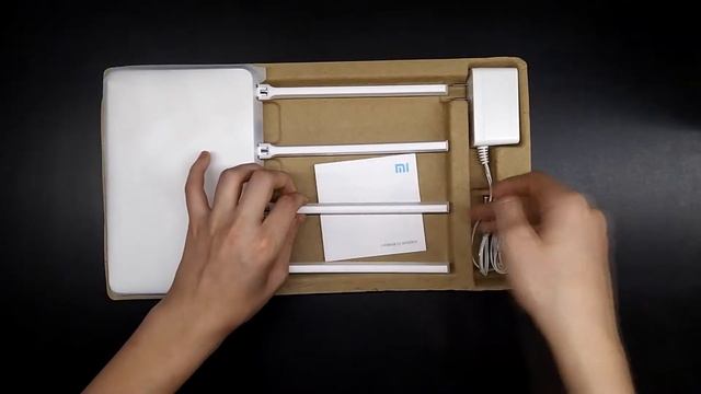 Распаковка Xiaomi Mi WiFi Router 3G 1 Гбит/с смотреть онлайн