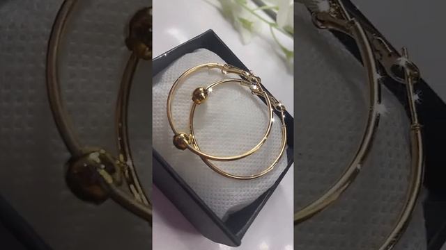 Серьги бижутерия "Кольца с подвижным шариком" золото 4см смотреть онлайн
