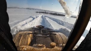 Трактор Кировец с бабочкой. Вдвоём с бульдозером пробиваем дороги на скважины.