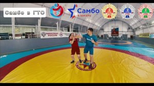 Самозащита. Действия ассистента: выполняет удар кулаком сбоку в голову.