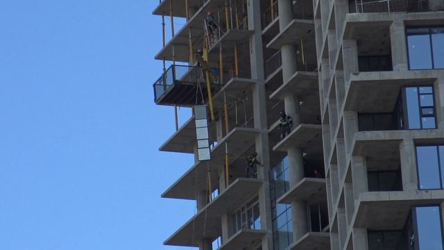 Window panels installation on a high-rise building - One Burrard Place смотреть онлайн