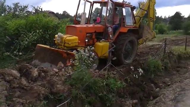 Выравнивание участка трактором юмз смотреть онлайн