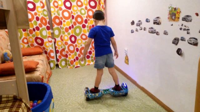 На гироскутере. 4 годика.