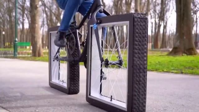 Велосипед с прямоугольными колесами на гусеницах смотреть онлайн