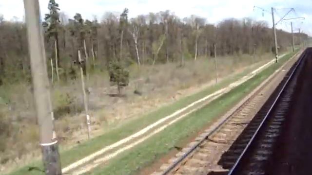 З вікна електропоїзда ЕД9М-0060 №6304 Жмеринка-Козятин. Гнівань-Селищанський. 23.04.2014 смотреть онлайн
