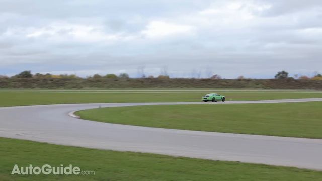 2013 Ford Mustang Boss 302 vs. 2013 Mitsubishi Lancer Evolution MR смотреть онлайн