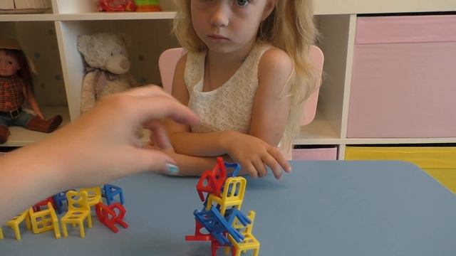 Распаковка настольная игра Дженго башня из стульев