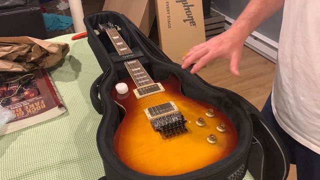 Unboxing an Alex Lifeson Epiphone Axcess Les Paul смотреть онлайн