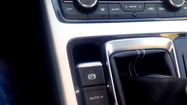 Geely Atlas разблокировка стояночного тормоза