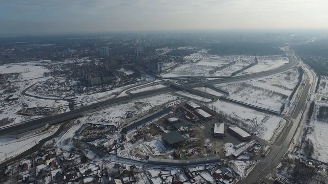 ярославское шоссе,рынок,развязка,строительство,ограда,зима,строительные материалы,клязьма,река,мост смотреть онлайн