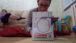 Стиральная машина и кирпич