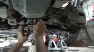 Замена передних рычагов подвески Мазда 3.