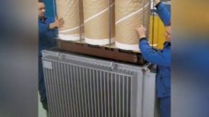 Сборка остова трансформатора с обмотками.