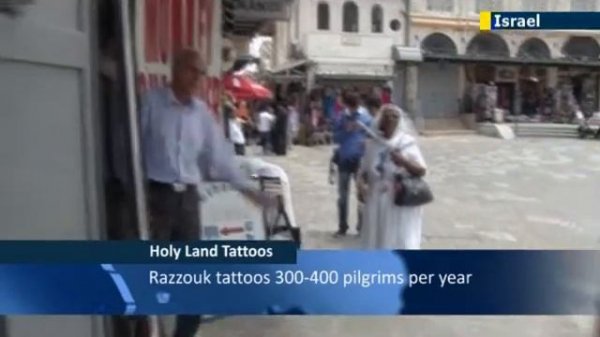 Orthodox Christians get traditonal crucifix tattoos as momentos of Jerusalem pilgrimage