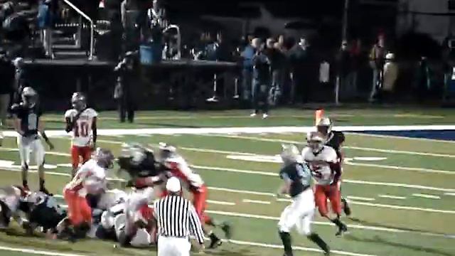 Levi Marshall and Troy Oyer bring down Chad Neff in the Minerva Lions 42-20 loss to the Louisville смотреть онлайн