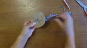 Браслет фенечка на картоне