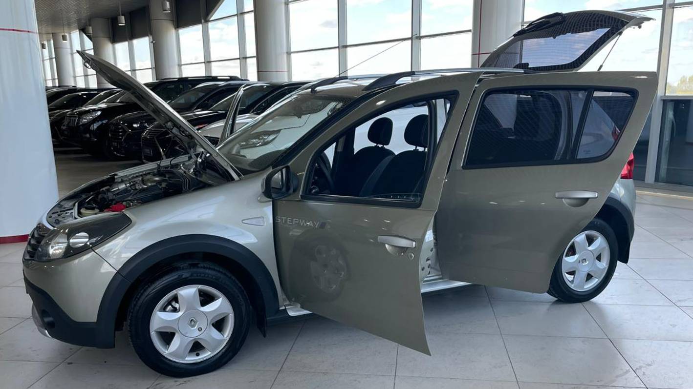 Renault Sandero Stepway I (2009—2014) 1.6 MT (84 л.с.) Базовая смотреть онлайн