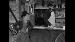 Charlie Chaplin and his brother Sydney in a scene from A Dog_s Life (1918)(1080P_HD).mp4