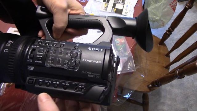 NXR NX100 camcorder box opening and overview смотреть онлайн