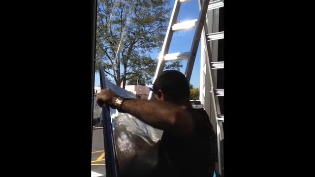 Over sized window film application by All American Window Tinting in Denver смотреть онлайн