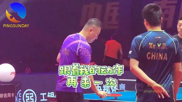 Coach Ma Lin demonstrates to Xu Xin how to receive a serve смотреть онлайн