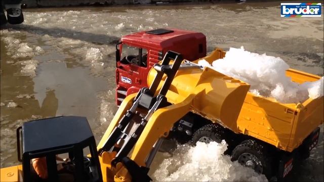 Самосвал Man с колёсным бульдозером FR130 02752 Bruder (Брудер) смотреть онлайн