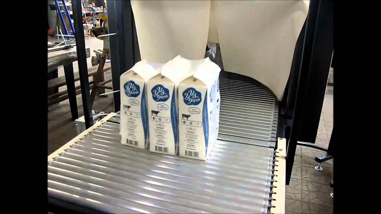 Как упаковать тетрапак и пюрпак в плёнку.Автомат с БПФ и поворотным транспортером смотреть онлайн