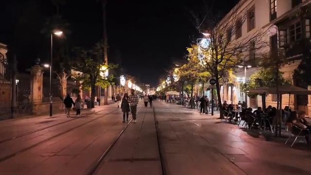 Enchanting Seville Night Tour - Spain's City of Lights Unveiled, a vibrant 4k video walk смотреть онлайн