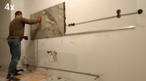 Укладка крупного керамогранита (160*80) на стену в одиночку