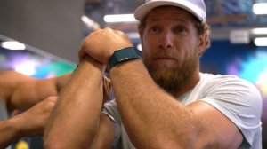 Demi Bagby attempts the Arm Challenge