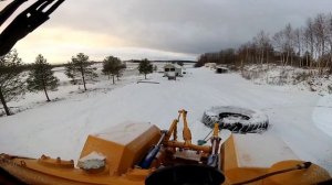 КИРОВЕЦ К 700. ТРАКТОР  К 700 А. Ровняет дорогу