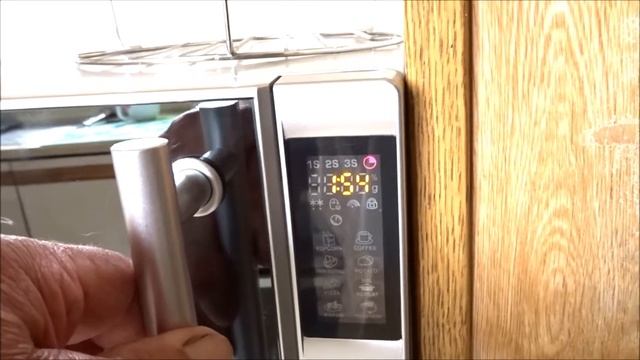 DeLonghi Microwave 900W смотреть онлайн