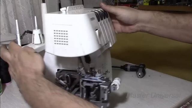 Как собрать корпус оверлока и отрегулировать нитеподатчик. Видео № 425. смотреть онлайн