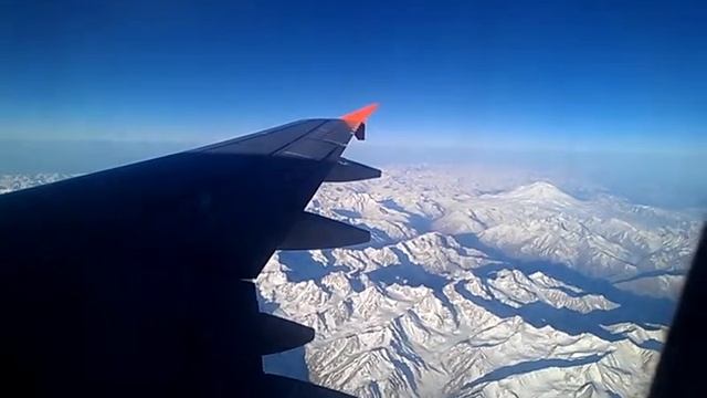 Airbus A319 Flight In The Sky On Mountains Kazbek,Georgia