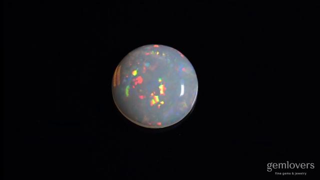 Опал из Эфиопии в огранке круг 8.55ct смотреть онлайн