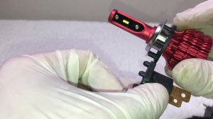 LED headlight bulb installation on a Mazda 3