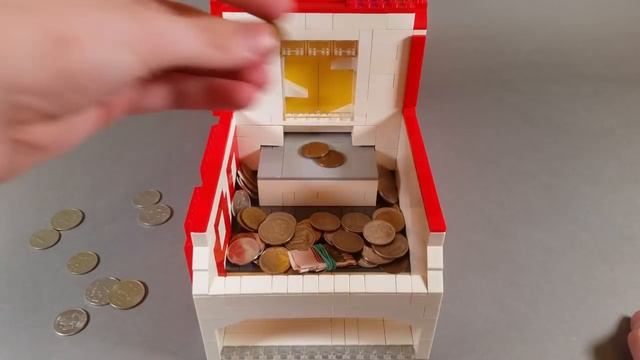ЭЛЕКТРИЧЕСКИЙ ИГРОВОЙ АВТОМАТ из ЛЕГО / Монетотолкатель из Лего! АЗАРТНО! смотреть онлайн