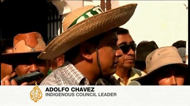 Bolivian indigenous activists protest new road in Amazon rainforest смотреть онлайн