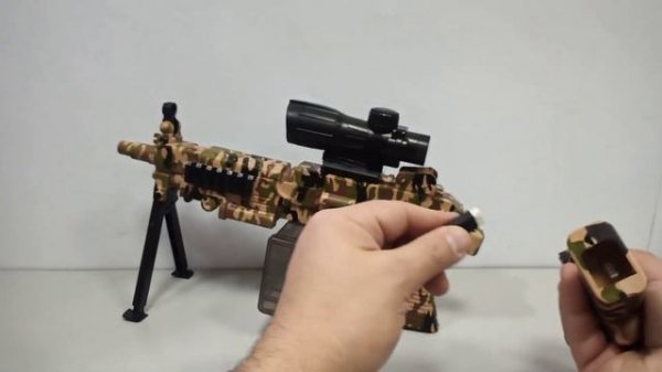 Детский ручной пулемёт Пила M249 SAW, на аккумуляторе, стреляет пульками 6 мм. и орбизами 6-7 мм